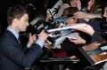 185140335-actor-daniel-radcliffe-signs-autographs-as-gettyimages.jpg