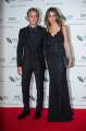 456811302-tom-felton-and-jade-olivia-attend-the-iwc-gettyimages.jpg