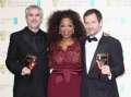 469765771-oprah-winfrey-poses-with-director-alfonso-gettyimages.jpg