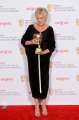 492011925-julie-walters-with-her-felowship-award-at-gettyimages.jpg