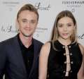 467487161-actors-tom-felton-and-elizabeth-olsen-arrive-gettyimages.jpg