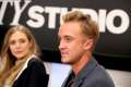 179965529-actors-elizabeth-olsen-and-tom-felton-speak-gettyimages.jpg