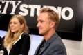 179965555-actors-elizabeth-olsen-and-tom-felton-speak-gettyimages.jpg