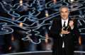 476291027-director-alfonso-cuaron-accepts-the-best-gettyimages.jpg